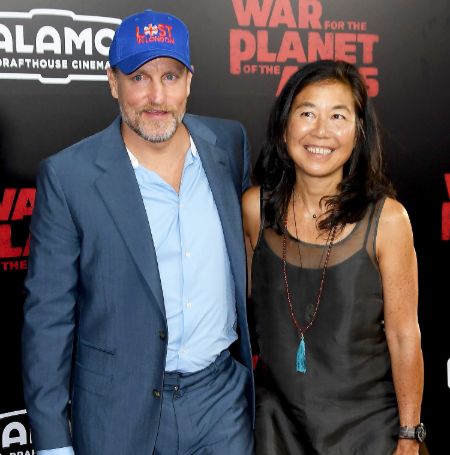 Woody Harrelson is currently married to Laura Louie.